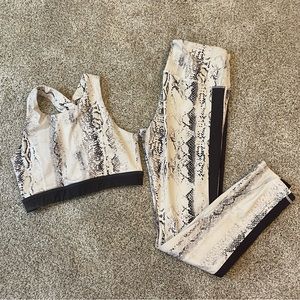 Matching sports bra and legging set. Cream/Black snakeskin print.